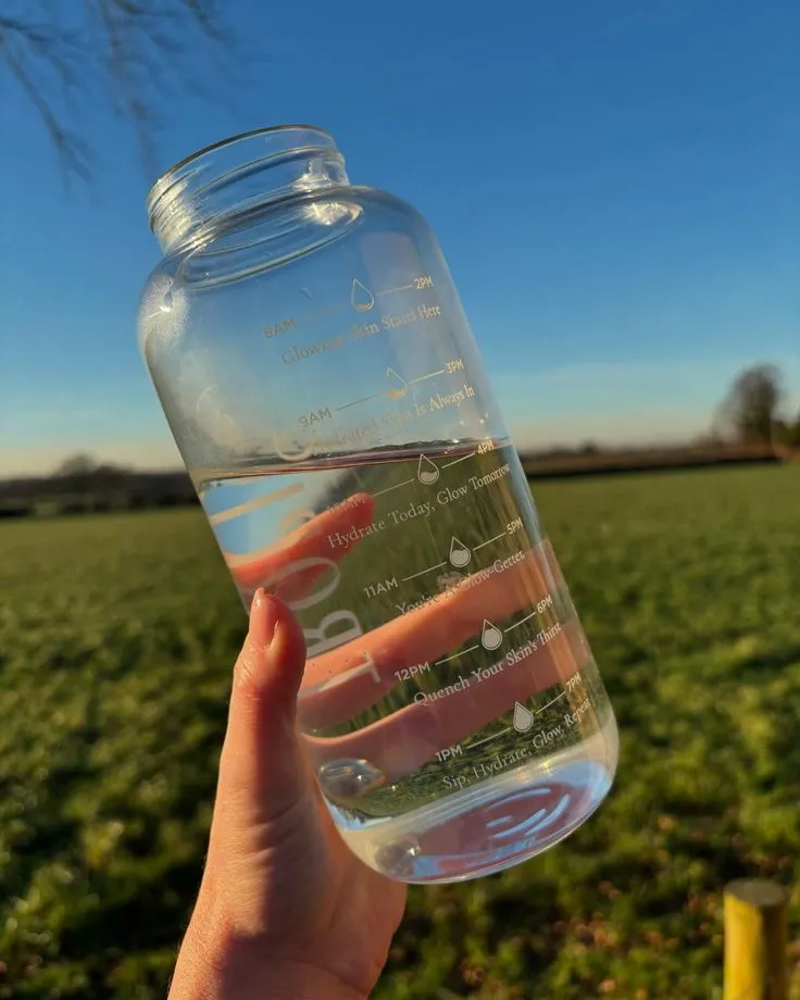 Curated hydration accessories on a wooden surface